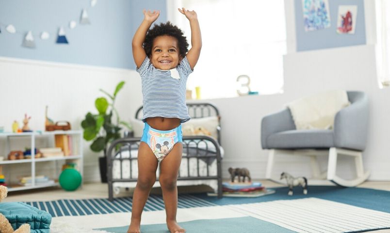 Child raising hands in excitement